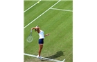 BIRMINGHAM, ENGLAND - JUNE 09:  Tamira Paszek of Austria serves against Lauren Davis of United States on day one of the AEGON Classic Tennis Tournament at Edgbaston Priory Club on June 9, 2014 in Birmingham, England.  (Photo by Tom Dulat/Getty Images)